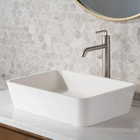 Ramus One Handle Vessel Sink Bathroom Faucet With Pop Up Drain Dope Matte Black Finish next to a white rectangular vessel sink