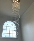 87 Inch Crystal Chandelier With Spiral Design, 6 Light Modern Ceiling Light for High Ceilings, shown in stairwell setting