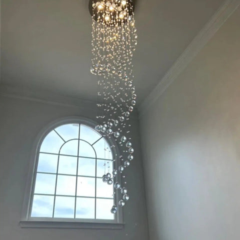 87 Inch Crystal Chandelier With Spiral Design, 6 Light Modern Ceiling Light for High Ceilings, shown in stairwell setting