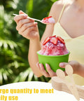 Person using 50 Pcs Disposable Wooden Spoons 6.3 Inch, Eco Friendly Biodegradable Cutlery For Camping Picnics Parties And Travel