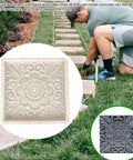 DIY Concrete Molds For Walkways And Garden Paths Stamps For Brick And Flagstone Casting Paver Molds For Garden Stepping Stones Durable Plastic Concrete Molds For Quick Backyard Path Makeovers being used on a grassy lawn by a person.