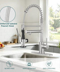BDJM Kitchen Faucets with Pull Down Sprayer,NEW1 in brushed nickel with reinforced weave hose in modern kitchen setting.