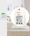 Sixteen Point Five Volt 40 VA Alarm And Doorbell Transformer Plug In For Home Security Systems shown beside security panel in room