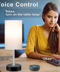 Woman using Smart RGB LED Bedside Lamp With USB Charging Ports, Multicolor Dimmable Table Light For Bedroom That Works With Alexa