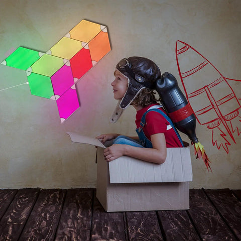 DIY RGB Line Lights Kit With 9 Light Bars And 9 Hexagon Panels, child with cardboard box rocket, colorful lights in background