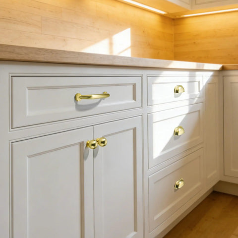 10 Pack 5 Inch Brushed Gold Cabinet Pulls Heavy Duty Solid Zinc Alloy Handles For Cabinets Dressers Kitchens And Bathrooms Easy Install Durable Furniture Pulls installed on white cabinets