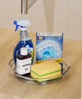 Smooth As Butter 4 Pack Lazy Susan Turntables with cleaning spray, detergent, and sponge on clear rotating tray.