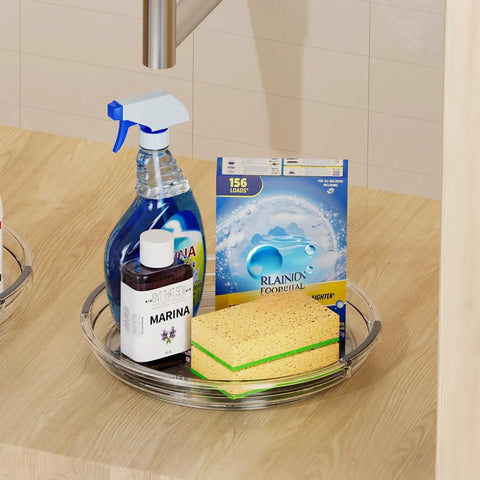 Smooth As Butter 4 Pack Lazy Susan Turntables with cleaning spray, detergent, and sponge on clear rotating tray.