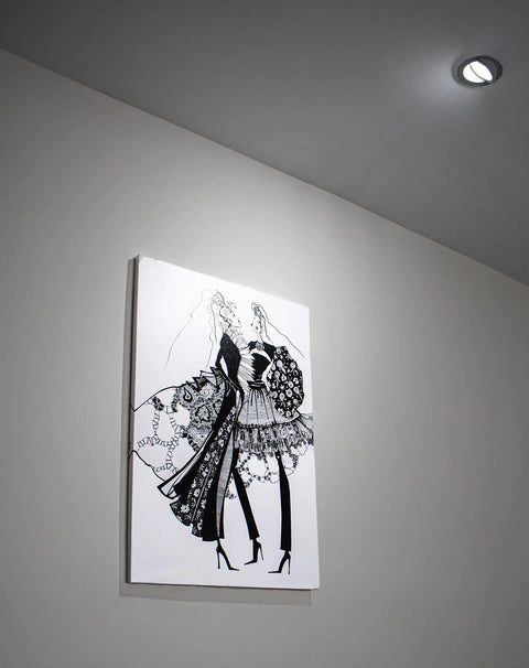 4 Inch Adjustable Eyeball LED Recessed Gimbal Light 9W 120V 900 Lumen illuminating artwork on wall