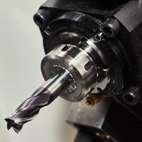Close-up of ER40 Spring Collet Chuck 30mm 65Mn Spring Steel showing precision clamping on CNC tool.