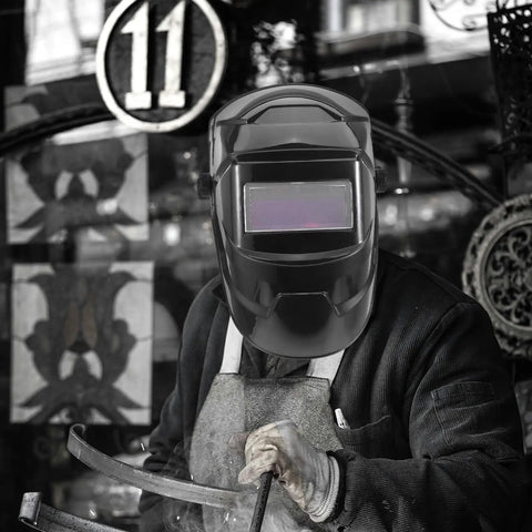 Person wearing Top Notch 3 Piece Welding Helmet Lens Replacement With 2.0x Magnification Durable PC Protective Shield.