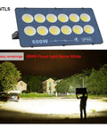 Ultra High Output Led Flood Light Heavy Duty Weather Proof Security Beacon Projector Bulb Beast Mode Cold White Beam No Joke Brightness For Backyards Job Sites And Parking Areas 6 Pack, 600W flood light showing bright illumination outdoors.
