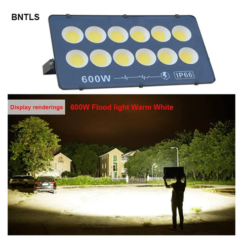 Ultra High Output Led Flood Light Heavy Duty Weather Proof Security Beacon Projector Bulb Beast Mode Cold White Beam No Joke Brightness For Backyards Job Sites And Parking Areas 6 Pack, 600W flood light showing bright illumination outdoors.
