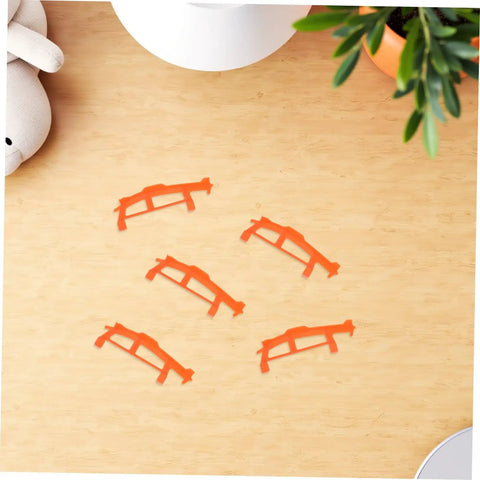 Five Pack Rubber Band Powered Glider Plane Kit For Kids And Fam, orange bracket accessories on a wooden table