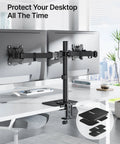 Rock Solid Adjustable Steel Monitor Mount Reinforcement Plate And Desk Stabilizer With Extra Wide Eva Base in a modern office setup.
