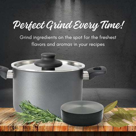Kitchen pot with glass lid on wooden countertop; rosemary sprigs nearby