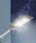 Rock Solid Solar Flood Lights Outdoor, Storm Proof Led Yard Lamp With Motion Sensor And Dusk To Dawn Switch, Drip Tight 60W illuminating in rain.