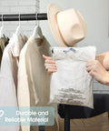 Person holding a white shirt in a Six By Nine Inch Self Seal Clear Poly Bags 1000 Count Bulk Pack With Suffocation Warning For Packaging And Shipping.
