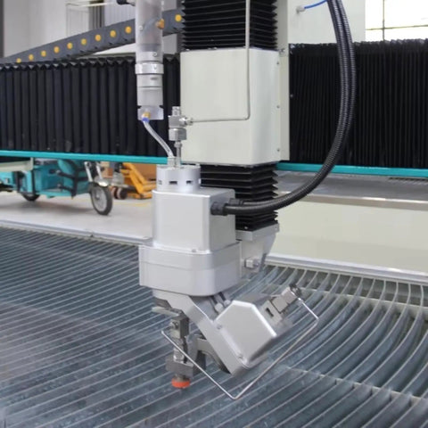 Rock Solid 5 Axis Cnc Water Jet Cutter Built Like A Tank Delivering Laser Precision Heavy Duty Grind For Metal Stone Glass And Concrete Shop Fabrication Projects close-up of cutting head