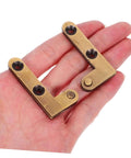Person holding heavy duty invisible pivot hinges for wood doors slick concealed self-closing bronze finish 2 pack hardware.