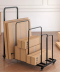 Built-Tough Cardboard Box Organizer On Wheels With Adjustable Storage Rack Metal Cart Stand With Handle in a living room setup.