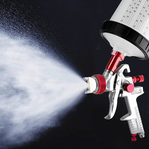 Pro Grade Paint Sprayer Kit With Quick Mixing Cup And HVLP Gun spraying paint, includes 1.4 1.7 2.0 mm nozzles