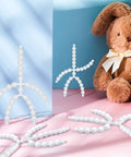 144 Piece Doll Armature Set With 4Y And 4X Chest Connectors Flexible Plastic Ball Joints in use with stuffed animal.