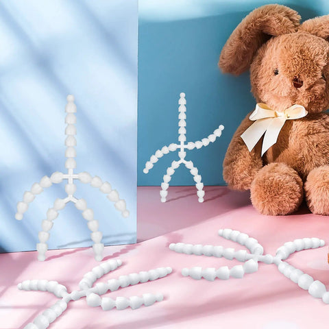 144 Piece Doll Armature Set With 4Y And 4X Chest Connectors Flexible Plastic Ball Joints in use with stuffed animal.