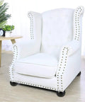Set Of 4 Solid Wood Furniture Legs Round Bun Feet For DIY Upgrades on white armchair, protecting wooden floor.