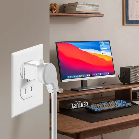 Room scene showing a Grounded 2 Prong To 3 Prong Outlet Adapter Converter Plug In And Go connected to a wall socket.