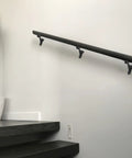 6 Pack 3 Inch Matte Black Hand Rail Brackets Rock Solid Heavy Duty Zinc Alloy Wall Mount Stair Support Hardware Effortless Home And Office Railing Installation System on a staircase.
