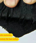 Close-up of Self Healing Butyl Roofing Seal Tape With Reflective Aluminum Foil Backing for waterproof application. Thick, black tape being handled.