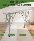 Aluminum scaffolding platform with black wheels on various flooring types, including tile and hardwood, in bright room.