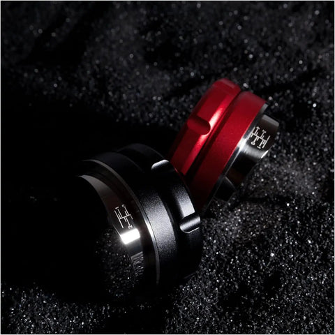 Legit Espresso Coffee Distributor Tamper For 57mm And 57.5mm Portafilters matte black and red finish on a dark background.