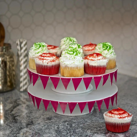 Cupcakes with green and red frosting on a tiered stand decorated with printed duct tape checker pattern 1.88 inch wide 10 yard roll