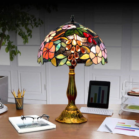 Tiffany Style Grape Rose Dope Stained Glass Table Lamp Handcrafted For Bedroom Living Room And Home Office Desk Decor With LED E26 Bulb Included 12x12x18 Inches on a desk