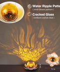 Outdoor Garden Solar Lights 2 Pack Amber Crackle Globe Lotus Decorations on tabletop, showing waterproof cracked glass and water ripple effect