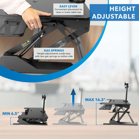 Height adjustment feature of Dual Monitor Standing Desk Converter with gas springs and manual lift mechanics.