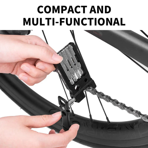Hands using 20 In 1 Bike Multitool Kit For Cyclists Portable Foldable Cycling Tool With Allen Wrenches Tire Levers Chain Breaker on bike chain