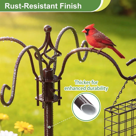 Close-up of rust-resistant garden bird feeding station with heavy duty metal squirrel baffle and cardinal perched on hook.