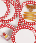 48 Pack Red And White Checkered Disposable Paper Plates For Backyard Kickbacks with food display on a table setting.