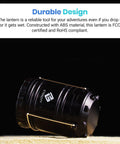 Four Pack LED Camping Lanterns For Power Outages And Emergencies, battery operated, collapsible black design on sand surface