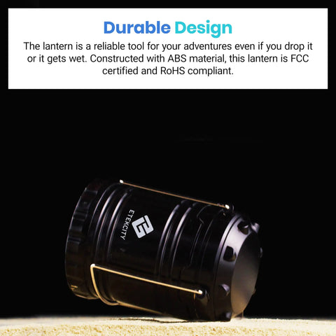 Four Pack LED Camping Lanterns For Power Outages And Emergencies, battery operated, collapsible black design on sand surface