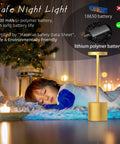 Two Pack Cordless Table Lamp Set with 5000mAh Rechargeable Battery, gold lamp by sleeping child, candles in background