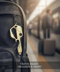 Compact Keychain Multitool for Quick On-The-Go Adjustments attached to backpack at train station, gold finish