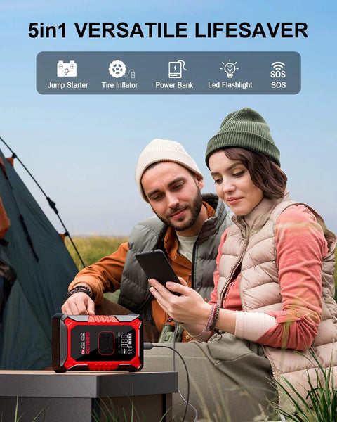Two people using Portable 3000A Jump Starter With Air Compressor For Cars And Trucks, 12V Supersafe Lithium Battery Booster while camping.