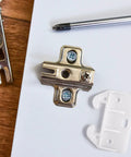 Slick White Plastic Drawer Track Guide Kit Packing 10 Pieces With Badass Durability And Hella Smooth Gliding Motion, metal and plastic components.