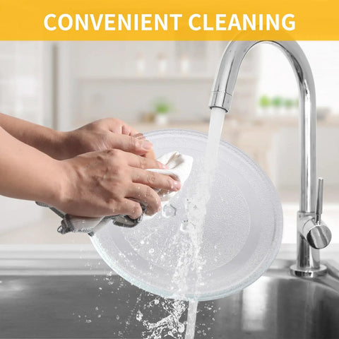 Person washing a 9.6 Inch Microwave Glass Plate Replacement Turntable, heat resistant, dishwasher safe, under running water.