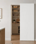Premium Fluted Panel Concealed Barn Door 36 By 84 Inches displayed as a smooth sliding entrance to a modern pantry.