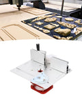 Heavy Duty Router Table Base Lifter Featuring A Smooth Hand Crank And Secure Four Jaw Grip For Hassle Free 51mm Stroke Adjustments On 64 To 66mm Motors In Any Garage Workshop Setup on a workbench with decorative wood carvings.
